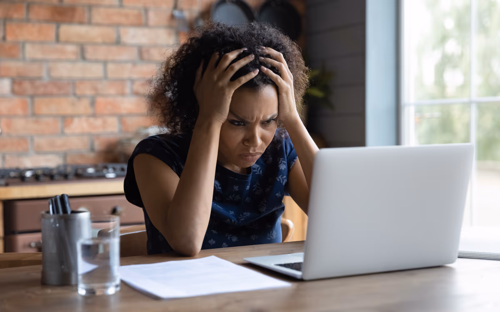 a business owner looking confused at their computer